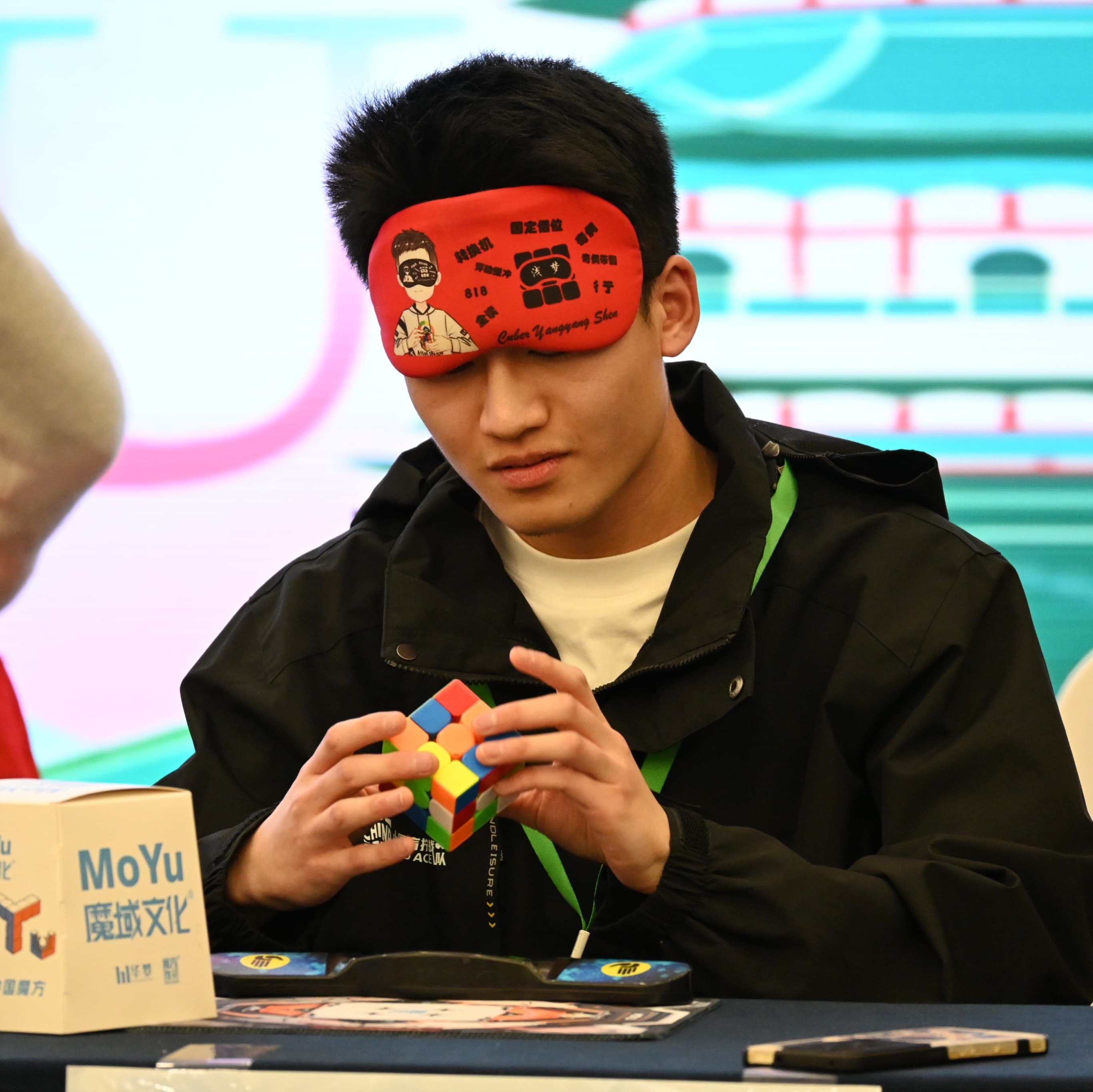 Yangyang Shen holding a cube